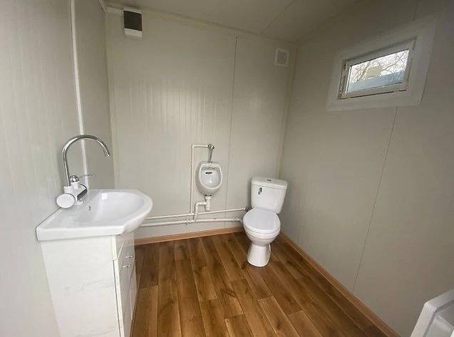 CONTENEDOR SANITARIO CON DOBLE CABINA WC