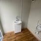 CONTENEDOR SANITARIO CON DOBLE CABINA WC