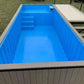 PISCINA CONTENEDOR ELEVADA CON TERRAZA INTEGRADA